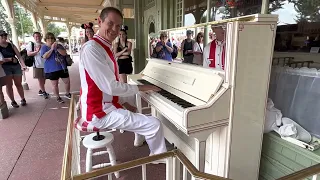 Disneys Pianist Neal playing our favorite tunes at Casey’s Corner in Magic Kingdom