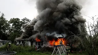 Jacksonville Fire Rescue Department responds to a double trailer structure  with heavy fire showing