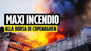 Maxi incendio alla Borsa di Copenaghen, crollata la guglia: evacuati Parlamento e governo danese