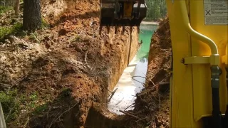 Busting A Pond Dam