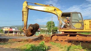 Caterpillar 365C Excavator Loading AUMAN Trucks And Operator View On Construction Site