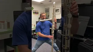 My husband trying to play the contrabass flute