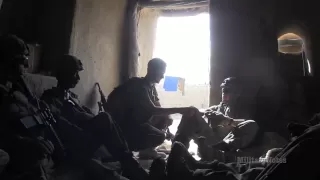 INTENSE COMBAT: U.S. Marines react to a surprise TALIBAN attack