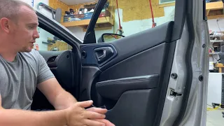 How to remove: 2015 Chrysler 200 door panels