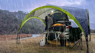 Rainy Car Camping in my Tesla Y - I found the perfect riverside spot