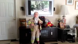 Rescue Riley getting on fireman gear