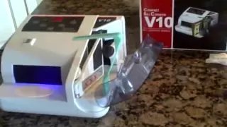 counting currency using the V-10 portable money counter