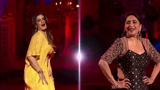 Madhuri Dixit and Raveena Tandon rocked the dance floor on Tip Tip Barsa Pani v720P