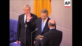 Merkel candidate Wulff sworn in as president