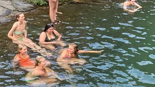 pretty girl taking a bath. The most beautiful waterfall has beautiful girls