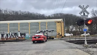 Impatient Driver Can't Wait For 2 Trains To Pass At 4 Track RR Crossing!  Caboose On 1st Train!