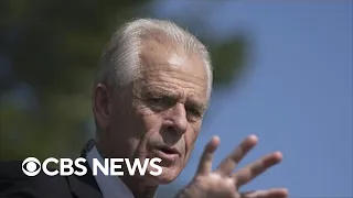 Former Trump adviser Peter Navarro says he has been subpoenaed by a grand jury