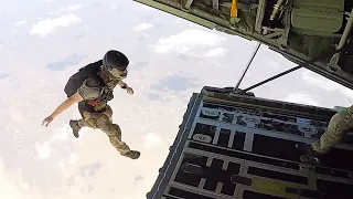 U.S. Air Force Pararescuemen Execute Cargo Drop and Tandem Jump from C-130J Super Hercules