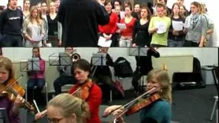 CREA orchestra sings AND plays Wilhelmus..