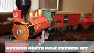 Nathan opening North Pole Express Christmas Train Set