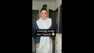 Amish girl getting dressed for church.