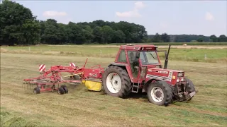 Ackergras Schwaden, Rundballen wickeln und Folieren. John Deere und Fiatagri.