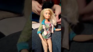 Dressing up my dolls and putting make up