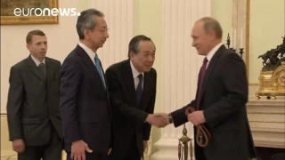 Putin's dog gives Japanese journalists an earful