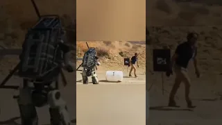 Man Bullies Robot While It's Training With Guns! 🤖 #Shorts