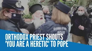 Orthodox priest shouts 'you are a heretic' to Pope