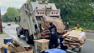 Rambone’s Mini Pak Mor Packing a Giant Cardboard Pile