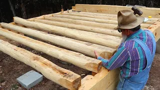 Installing the Floor Joist - Dovetail Log Cabin Build (Ep 17)