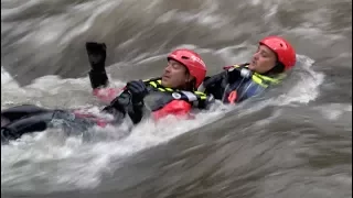First responders work on swift water rescue techniques on Clear Creek