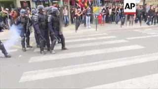 Protesters and police clash in Paris