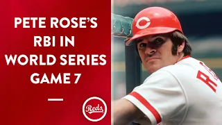 Pete Rose drives in a run in Game 7 of the 1975 World Series