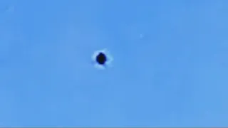 Black Sphere Shaped UFO Filmed Moments Before Vanishing Into Thin Air Over Sand Springs, Oklahoma.