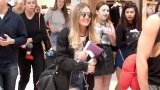 LITTLE MIX'S PERRIE EDWARDS WALKS WITH FANS THROUGH SYDNEY AIRPORT