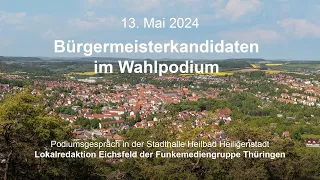 Kandidaten im Wahlpodium