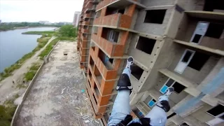 Friday Freakout: BASE Jumper Strikes Building In Russia