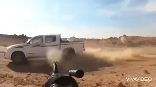 Army Forces Bullet Machine Gun and Ak47 doesn't stop Toyota Hilux Vigo