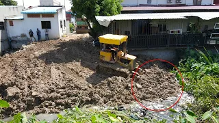 Update Continue Location Last Electricity Pillar with Operator Bulldozer Push Stone In Deep  water