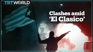 Catalan protesters clash with police during Spain’s ‘El Clasico’ match