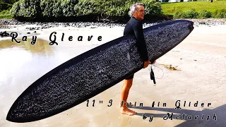 Ray Gleave riding an 11"3 twin fin Glider.