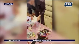 Пачки украденных денег нашли у главбуха учебного заведения Караганды