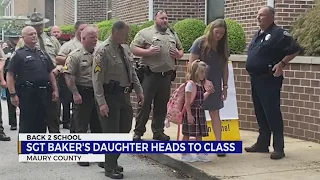 VIDEO: Daughter of slain Tennessee office receives police escort into first day of school