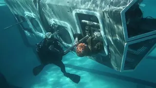 Camp Pendleton Marines submerge in Helo Dunker