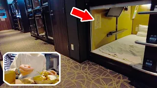 Staying at a super cheap capsule hotel with all-you-can-eat curry and a large public bath!