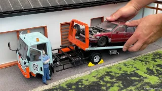1:18 Naveco Yuejin flatbed tow truck with accessories - DBGT [Unboxing]