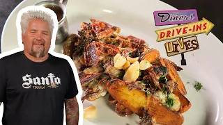 Guy Fieri Eats Fingerling Potato Poutine | Diners, Drive-Ins and Dives | Food Network