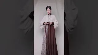 Chinese traditional clothes, hanfu. Chocolate color scheme.