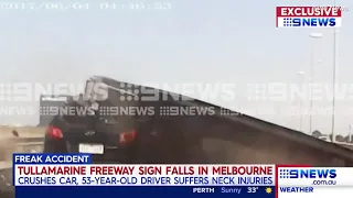 Terrifying moment a highway sign falls and crushes a 4WD