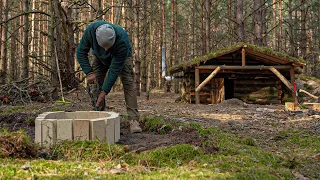 Cozy Dugout shelter building, Made a place for firewood and a place for a fire