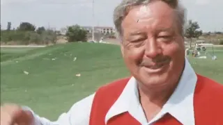 Jackie Gleason showing off his golden golf clubs and customised cart 1976 Florida