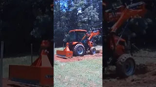 Rural King RK37SS  tractor making garden