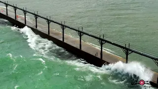 Kids Almost Swept Off Lighthouse Pier Huge Waves Wash Over Pier As Kids Hang On Drone Footage